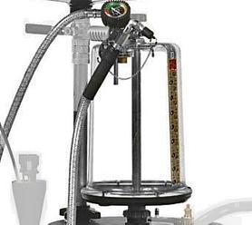 Suguglas á sorakút með mæli og sogslöngu